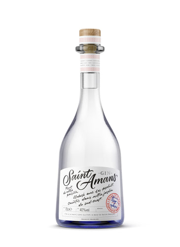 Bottle of Saint Amans Gin Original,  a French London Dry gin. The gin is colourless, and the bottom of the bottle is dark blue, with red-accented labels on the neck and a red artisanal stamp.