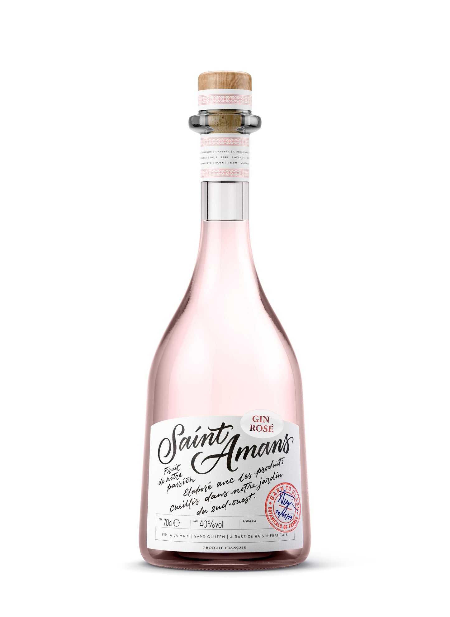Our refined and fresh French Rosé Gin bottle, featuring our iconic red stamp and Saint Amans label. French: Notre bouteille de gin française raffiné et fraîs, avec son tampon rouge iconique et son étiquette Saint Amans.