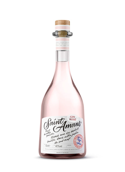Our refined and fresh French Rosé Gin bottle, featuring our iconic red stamp and Saint Amans label. French: Notre bouteille de gin française raffiné et fraîs, avec son tampon rouge iconique et son étiquette Saint Amans.